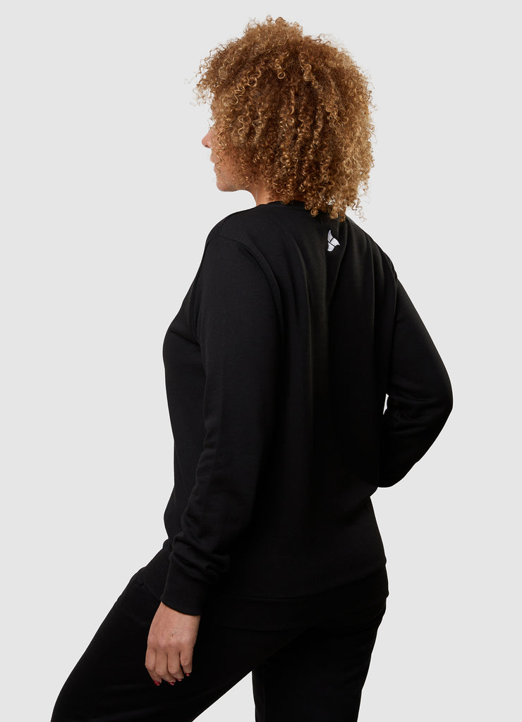 Woman wearing TRI-FIT Casualwear black sweatshirt