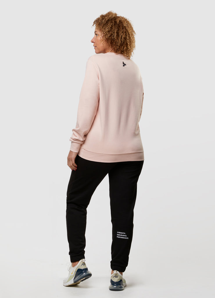 Woman wearing TRI-FIT Casualwear dusty pink sweatshirt