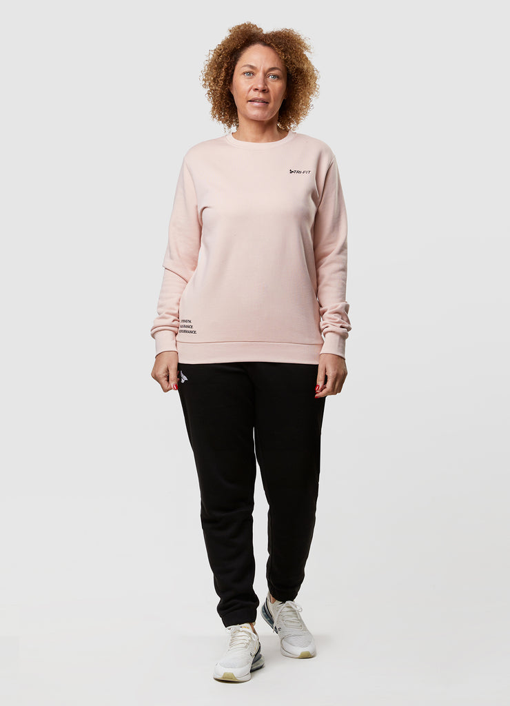 Woman wearing TRI-FIT Casualwear dusty pink sweatshirt