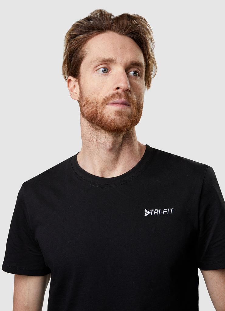 Man wearing TRI-FIT Casualwear black cotton T-Shirt.