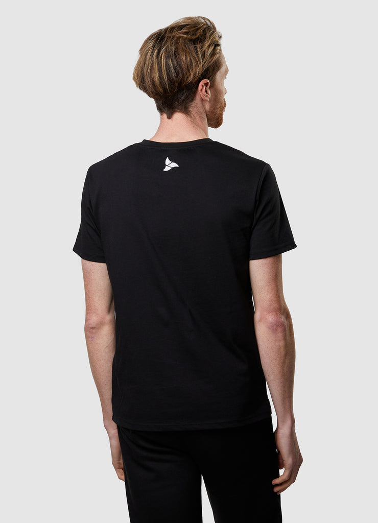 Man wearing TRI-FIT Casualwear black cotton T-Shirt.