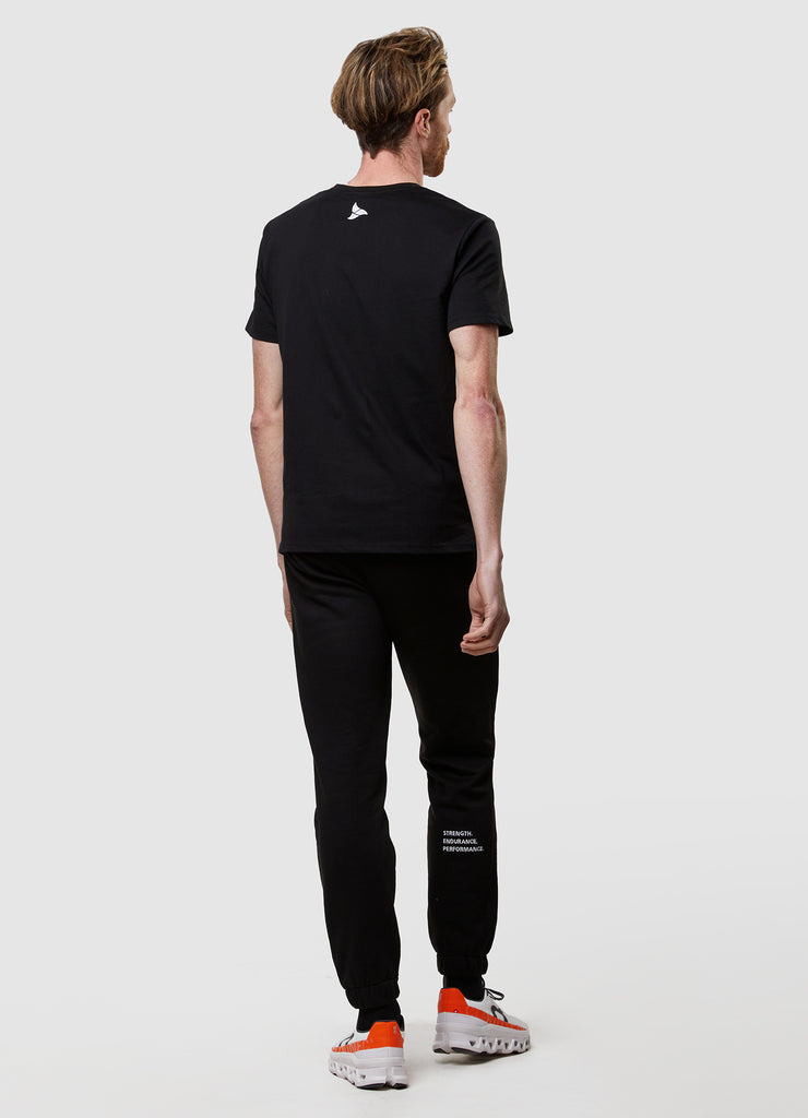 Man wearing TRI-FIT Casualwear black cotton T-Shirt.