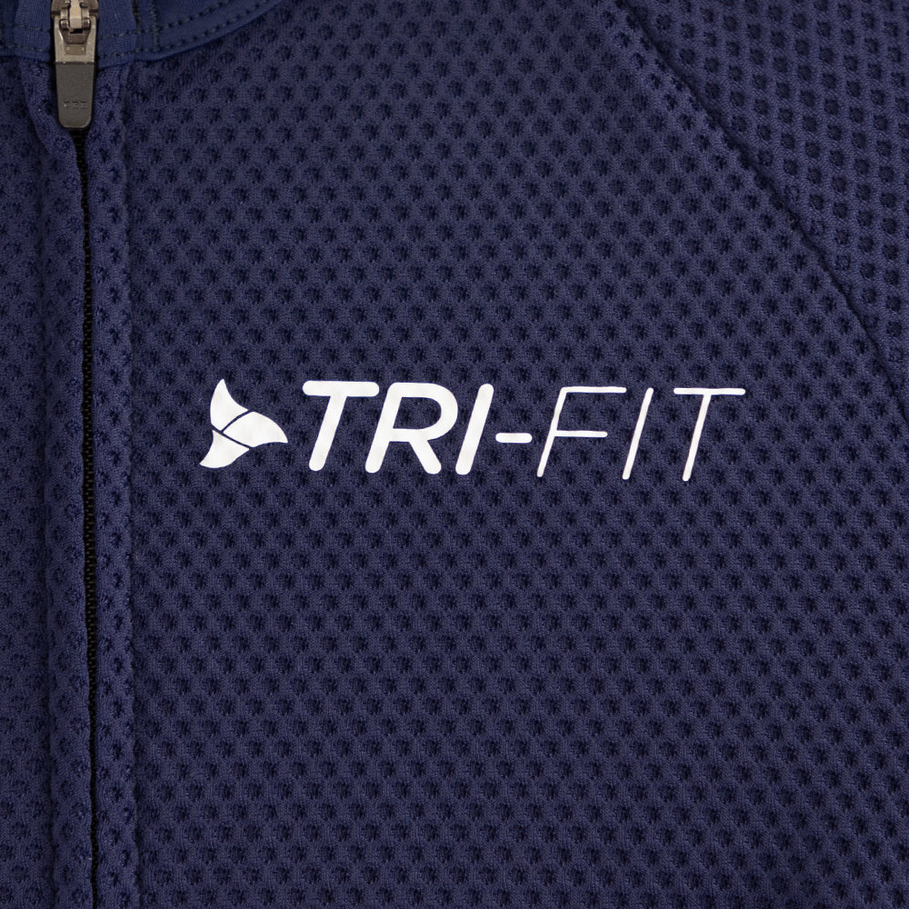 Close-up of TRI-FIT logo printed on chest of men’s VANGUARD tri-suit in navy, with breathable textured mesh fabric